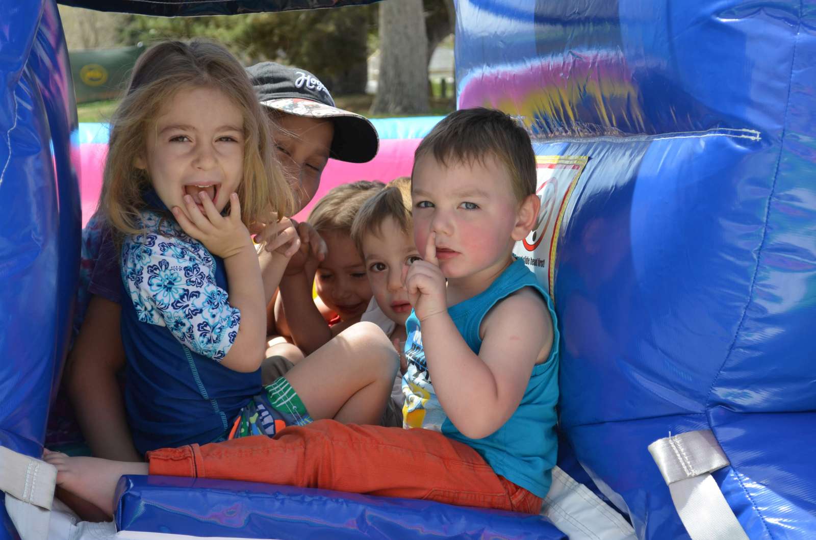 Children enjoying the bouncy houses